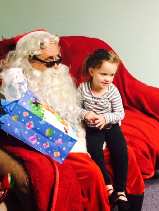 Blind Santa with a child
